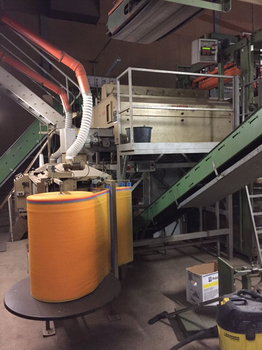 4588 Affeldt Computer weigher 12 head with rollstock net bagger