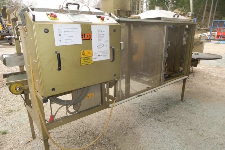 4588 Affeldt Computer weigher 12 head with rollstock net bagger