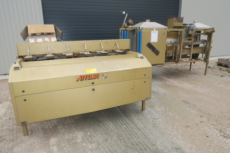 4588 Affeldt Computer weigher 12 head with rollstock net bagger